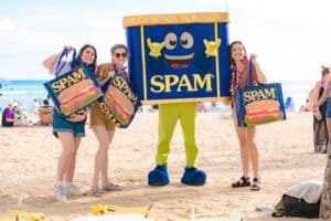 women standing with can of spam character