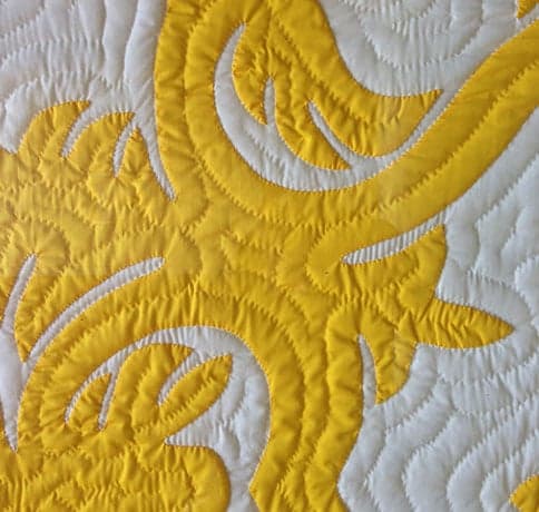 Yellow and white quilt