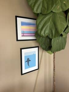 Polu prints hanging on wall