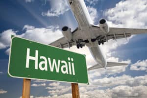 Plane over a Hawaii sihn